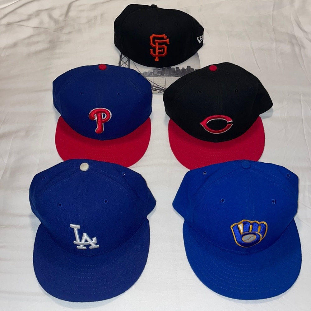New Era Men’s fitted hat (sold individually)